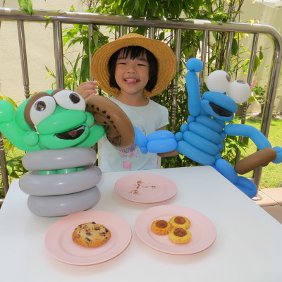 Oscar the Grouch and Cookie Monster at a tea party