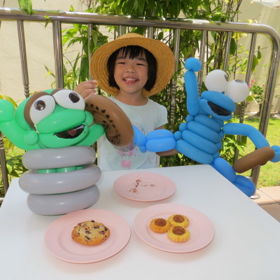 Oscar the Grouch and Cookie Monster at a tea party